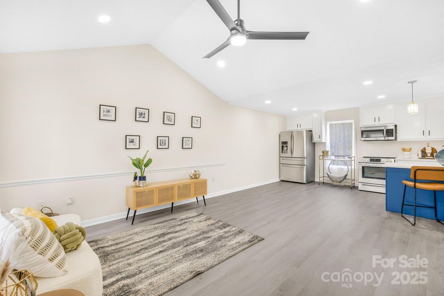 Relax & enjoy stunning sunsets from the rocking chair front porch of this upgraded ranch in Lincolnton! Featuring an open floor plan w/vaulted ceilings, a spacious kitchen w/granite countertops, white cabinets, SS appliances, & oversized island—perfect for hosting family & friends. Fresh paint, new lighting, ceiling fans, updated baths & new LVP flooring throughout add to its charm. The Primary bedroom offers an en-suite w/designer walk-in shower, while the 2 additional  bedrooms share an updated full bath. Outside, a nearly half-acre lot with mature trees provides ample space for gardening, play, or simply unwinding in a peaceful, country setting—all with no HOA restrictions. So whether you’re relaxing on the porch or grilling on the expanded deck, you’ll love the country vibe & charm. Close to shopping, dining, & highways, this home is truly move-in ready. Seller offering concessions & home warranty options for buyers peace of mind!