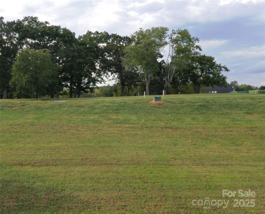 Prime Building Lot in Walnut Ridge at Rock Barn! Build your dream home on this beautiful lot that is ideally positioned on elevated ground with a tranquil common-area green-space right across the street. In addition to this prime building lot you can enjoy an active and relaxing lifestyle with all the amenities of Rock Barn Golf and Spa including (membership and fees required): Two Championship Golf Courses; A Member Clubhouse with Two Restaurants; A Golf Clubhouse with Grill and Locker Rooms; The Renowned Rock Barn Spa and Fitness Center; Championship Tennis and Pickle Ball Courts; A Resort-Style Outdoor Aquatic Center; .An Equestrian Center for Horse Lovers

This is more than a place to build—it’s an invitation to live an active or leisurely lifestyle in one of the area’s most prestigious golf, tennis and spa communities!