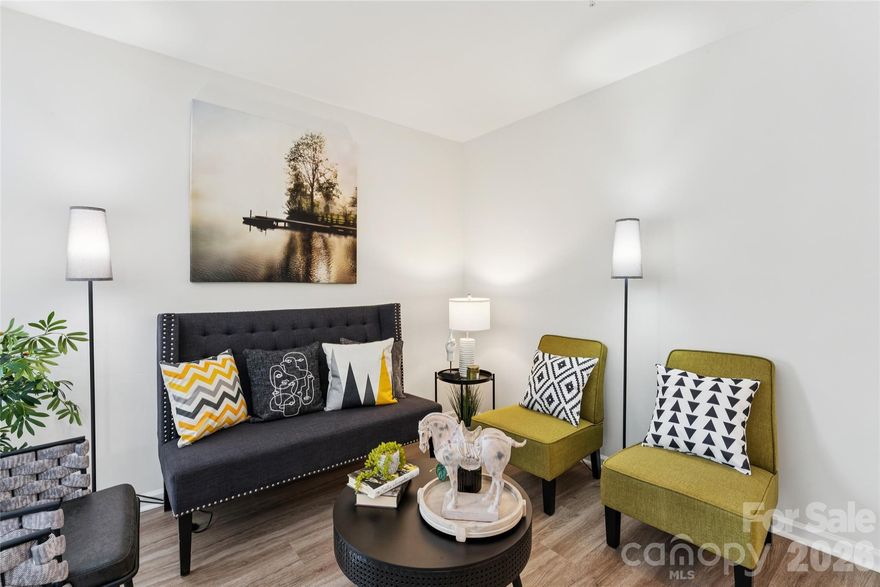 This unit is move in ready. Freshly painted with new Luxury vinyl flooring throughout.  It has new stainless steel appliances and new window blinds that remain.  Open floorplan is excellent for entertaining family and friends.  New range has built in AIR FRYER.  This condo has been completely renovated with brand new kitchen with Quartz countertops. and new white cabinets.  New subway tile backsplash completes the modern look.  New updated light fixtures throughout including hallway. All interior doors including closets have been replaced.  Bathrooms have been upfitted with new fixtures, lighting,  and vanity with drawer. New smooth ceiling with overhead lighting in all 3 bedrooms.  Brand new windows have just been installed and blinds remain with unit.  This condo has all the high end features without the price tag.