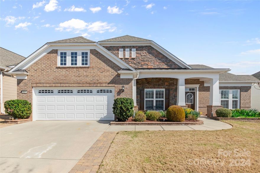 Stunning Morningside Lane w/ sunroom + 4-season room! Inviting brick front w/ stamped concrete front porch. Whole home generator, radiant barrier insulation, crown moulding, & plantation shutters throughout! Chef's kitchen boasts granite counters, tile backsplash, under cabinet lighting, SS appliances, spacious island, & custom pantry. The formal dining room w/ butler's pantry is great for hosting! Entertain in the great room w/ a gas log fireplace, custom built-ins, & surround sound, or relax in the sunroom w/ windows overlooking the rear patio. Unwind in the 4-season room w/ a ceiling fan & mini-split unit while enjoying the wooded rear view through the large windows! Enjoy fresh air on the paver patio. The front flex space w/ French doors & built-ins can be used as an office or hobby room! Primary suite has a tray ceiling, dual sink vanity w/ granite counters, custom tile shower, makeup vanity, & a custom walk-in closet. 2 guest bdrms w/ their own private bath! Don't miss this home!