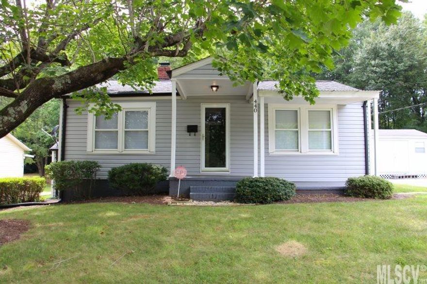 Well maintained, 3 bedroom, 1 bath ranch home features a covered, front porch, back covered patio, & partially fenced-in, private back yard.  The large living room welcomes you in and allows a lot of natural light.  New carpet was installed in the living room & bedrooms 2017.  Pass through bedroom 3 to enter the kitchen with eat-at bar, dining area, & new laminate wood flooring 2017.  Laundry hookups are also in the kitchen & plenty of cabinet space.  The private back yard has an outbuilding & a 12’ x 16’ shed w/ power & window unit A/C.