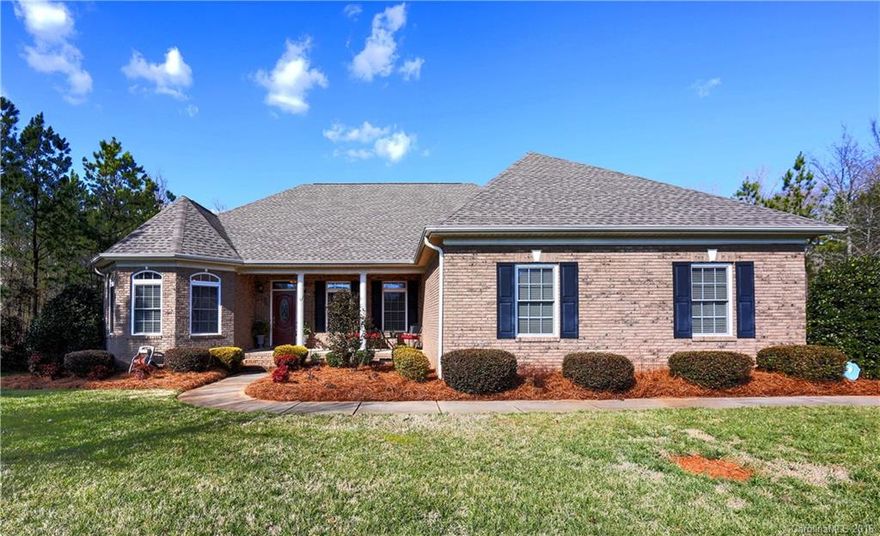 Stunning from the Moment you Walk Through the Front Door. Arched Doorways, Vaulted & Trey Ceilings, Ceramic Tile Foyer & Heavy Moldings in this all Brick Ranch give this Home Tons of Character. Formal Dining Rm, Office/Study & 600 Sqft Bonus Up Stairs. Beautiful Bright Open Split Bedroom Floor Plan. Beautiful Hardwood Flooring, Granite & Stainless Steel in Kitchen w/Breakfast Nook & Island. Covered Brick Patio, Whole Yard Irragation & 2-Car Garage. This Home Shows Like a Model.  Move In Ready!!