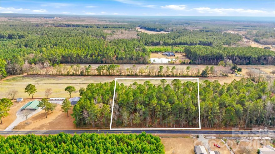 Beautiful 1-acre lot in Whiteville, NC, surrounded by well-kept ranch-style homes. The property features over 150 feet of road frontage, offering easy access and flexibility. No restrictions — mobile and manufactured homes are allowed. The land is outside the floodplain and wetlands, making it well-suited for development. An older cabin is located on the property and may have some existing utilities; buyer to verify all utilities and condition. A well and septic will be required. Excellent opportunity — this will not last long.