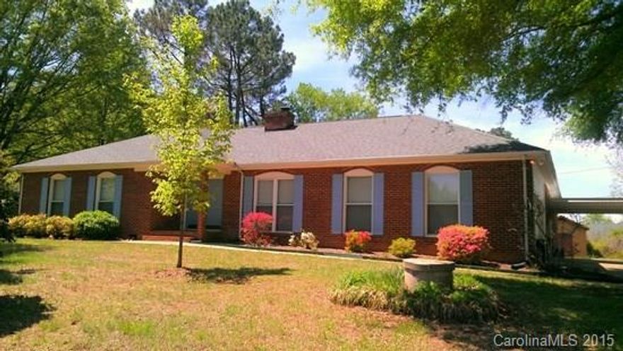 This is a great income property.  The all-brick four-bedroom ranch has 4 bedrooms and 2 bathrooms and sits on a large lot in a quiet neighborhood near I-485.  2-car attached garage plus 3-car carport.  New roof, new furnace, new water heater.  Shed/workshop with electricity.  Additional 1,000 sq. ft. guest-house with separate entrance.