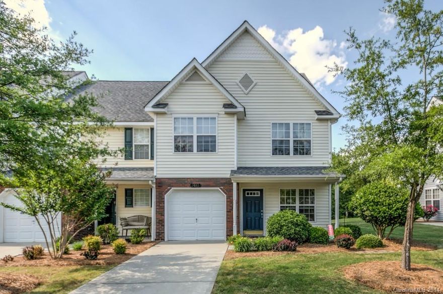 Immaculate END-UNIT W/GARAGE, 1- YR HOME WARRANTY! Neutral paint throughout.  Natural light from lots of windows pours in this dramatic 2-story den w/ gas-log fireplace w/fluted mantle. Dark cherry kitchen cabinetry. Step outside to wooded privacy & open side-yard space! Upstairs loft w/ 2 closets to serve as 3rd bedroom/office/sewing/exercise room. Master has cathedral ceiling with a HUGE walk-in closet! Prestigous Hanover Place has well-groomed grounds w/ low monthly dues & high reserves!