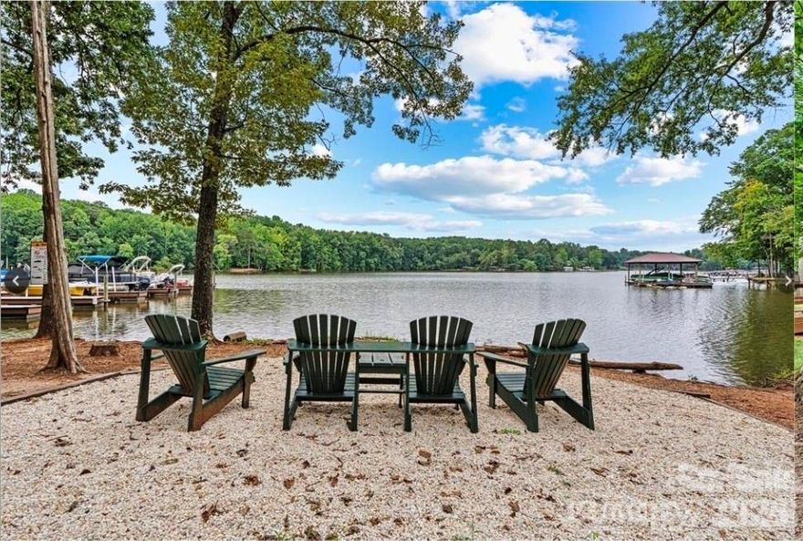END UNIT | Lake Access Community | The Vineyards at Lake Wylie, boat launch, resort-style pool, pickleball courts, and walking trails...just minutes from the upcoming River District development and downtown Belmont..

Residents enjoy lake access with a boat launch, kayak and paddleboard launch, plus boat & RV storage available for a fee. Community amenities also include a clubhouse, fitness center, two dog parks, and beautiful waterfront gathering areas (with picnic tables and bbq chairs).

Built in 2022, offering nearly 2,000 square feet, this home features a bright, open layout with a spacious great room and beautifully designed kitchen, perfect for everyday living and entertaining. The primary suite is conveniently located on the main level, while upstairs you’ll find generously sized secondary bedrooms with walk-in closets and a versatile loft ideal for a home office, playroom, or additional living space. The townhome also includes a two-car garage, driveway parking, and convenient guest parking located nearby. As an end unit, the home enjoys additional natural light and a greater sense of privacy compared to interior units. 

Conveniently located near Charlotte Douglas International Airport, Charlotte Premium Outlets, and charming downtown Belmont, known for its popular restaurants, breweries, and local shops.