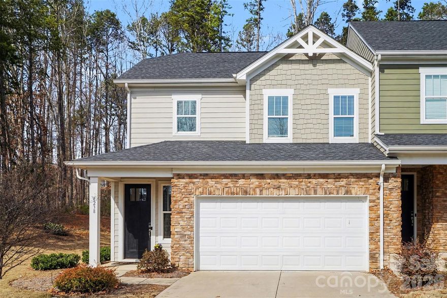 Exceptional end-unit townhome with two-car garage in the prestigious Redwood Rookery at The Vineyards, offering a rare opportunity to enjoy the Lake Wylie lifestyle with unmatched amenities. Residents enjoy access to boat launch and docks, lakeside recreation areas, clubhouse, fitness center, two resort-style pools, tennis, pickleball, and bocce courts, walking trails, playground, and dog parks. Inside, the light-filled open floor plan creates an inviting atmosphere with EVP flooring throughout the main living areas. The great room opens to a private patio and fenced backyard, providing the perfect setting for relaxing or entertaining. The kitchen features granite countertops, stainless appliances, and a spacious island ideal for gathering. The main-level primary suite offers comfort and privacy with a large walk-in closet and spa-style bath with dual vanities and oversized shower. Upstairs, a flexible loft, full bath, and two additional bedrooms with walk-in closets provide space for guests, work, or hobbies. Ideally located just minutes from Belmont and Uptown Charlotte. HOA includes water, sewer, trash, and front lawn maintenance. PROFESSIONAL PICTURES TO BE UPLOADED WEDS 3/4/2026
