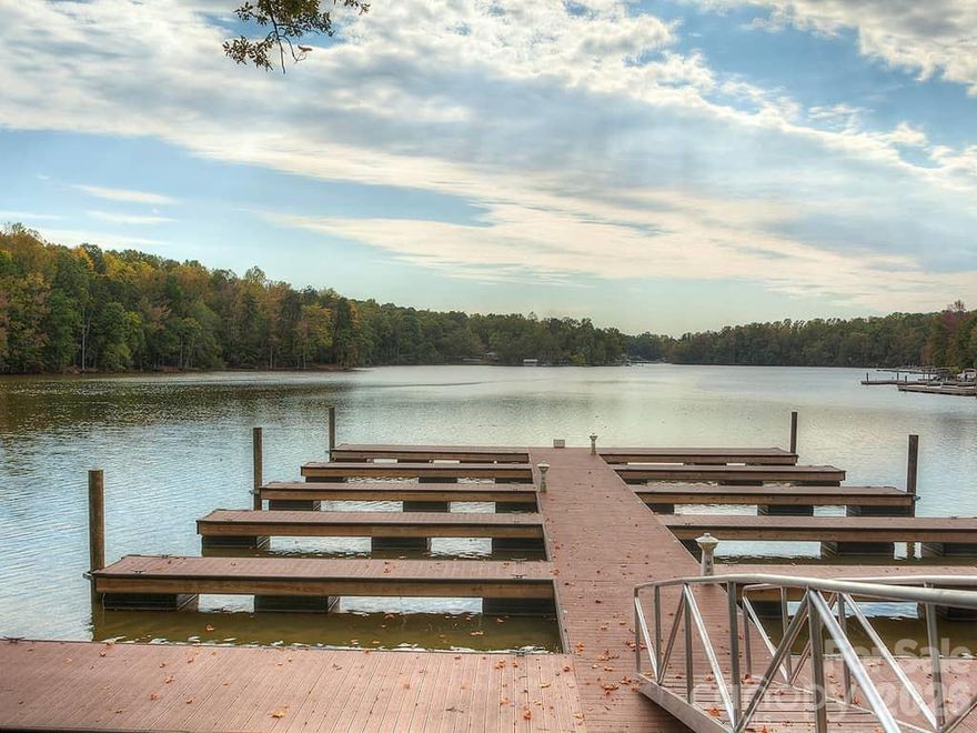 END UNIT | Lake Access Community | The Vineyards at Lake Wylie, boat launch, resort-style pool, pickleball courts, and walking trails...just minutes from the upcoming River District development and downtown Belmont..

Residents enjoy lake access with a boat launch, kayak and paddleboard launch, plus boat & RV storage available for a fee. Community amenities also include a clubhouse, fitness center, two dog parks, and beautiful waterfront gathering areas (with picnic tables and bbq chairs).

Built in 2022, offering nearly 2,000 square feet, this home features a bright, open layout with a spacious great room and beautifully designed kitchen, perfect for everyday living and entertaining. The primary suite is conveniently located on the main level, while upstairs you’ll find generously sized secondary bedrooms with walk-in closets and a versatile loft ideal for a home office, playroom, or additional living space. The townhome also includes a two-car garage, driveway parking, and convenient guest parking located nearby. As an end unit, the home enjoys additional natural light and a greater sense of privacy compared to interior units. 

Conveniently located near Charlotte Douglas International Airport, Charlotte Premium Outlets, and charming downtown Belmont, known for its popular restaurants, breweries, and local shops.

The HOA covers water, trash, lawn maintenance (outside fenced areas), street maintenance, and exterior upkeep including the roof, siding, and gutters...making for an easy, low-maintenance lifestyle.