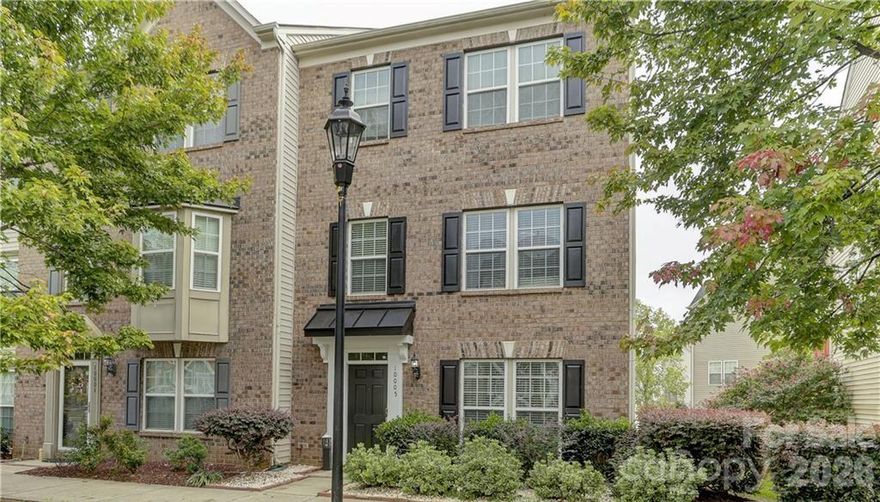 Welcome to Ayrsley Town Center and this beautifully updated end-unit townhouse offering 3 bedrooms, 2.5 baths, and a long list of new updates throughout.  With a prime walkable location within Ayrsley Town Center, you are just steps away from all the shops and restaurants, this home truly has it all. The main living areas shine with newer luxury vinyl plank flooring across the first two floors, giving the home a fresh, modern feel from the moment you walk in.  The large kitchen offers generous counter space and room to cook, making it a dream for anyone who likes to entertain. The flexible second floor bedroom features custom sliding barn doors and easily doubles as a home office or guest suite.  The spacious primary bath has been recently renovated to include a newer shower, floor to ceiling tile and newer flooring.  Step outside to your large, elevated deck – perfect for relaxing, grilling, or hosting guests. Major systems have all been replaced, including a newer(2024) top-of-the-line HVAC, furnace and water heater(2024), giving you total peace of mind for years to come.  The two-car garage and two-car driveway round out this home with ample parking and storage.  All of this just a short walk to your private community pool and everything the neighborhood has to offer.
