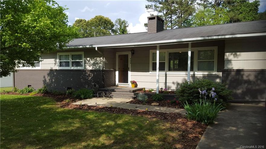 EXTENSIVELY REMODELED HOME IN GRANITE QUARRY LOCATED WITHIN WALKING DISTANCE OF TWO CITY MAINTAINED PARKS. HARDWOOD AND TILE FLOORS THROUGHOUT. STAINLESS STEEL APPLIANCES AND NEW KITCHEN CABINETS. PARTIALLY FINISHED BASEMENT WITH FIREPLACE. MOVE IN READY AND IN IMMACULATE CONDITION. HAS A 24' X 24' DETACHED GARAGE.