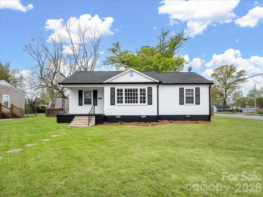 Lovely ranch home on a nice level corner lot with parking in the rear yard with an RV Parking 50 AM. Interior and exterior freshly painted. The Roof is about 7 years old, and the gas pack is about 10 years old. The water heater is an electric low-boy in the lower kitchen cabinet, common for this age home. The kitchen opens to the dining area, with a nice backsplash, a refrigerator, and hardwood flooring throughout the home. Your laundry area is on the rear porch—a nice front porch to enjoy the morning and your coffee. Call for your showing now!