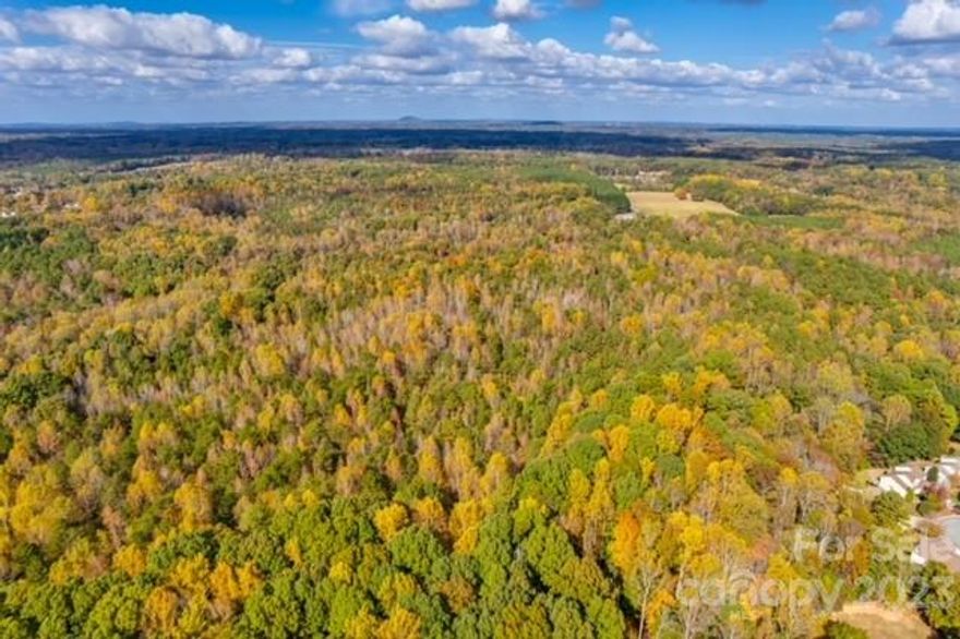 Prime property ready for development or preservation. Close to Lake Wylie. Property is zoned RUD-1. One acre lots. The comprehensive plan calls the area rural residential, meaning rezoning to a higher density will not be supported. There are utilities just to the south There is an old home place still on the property.