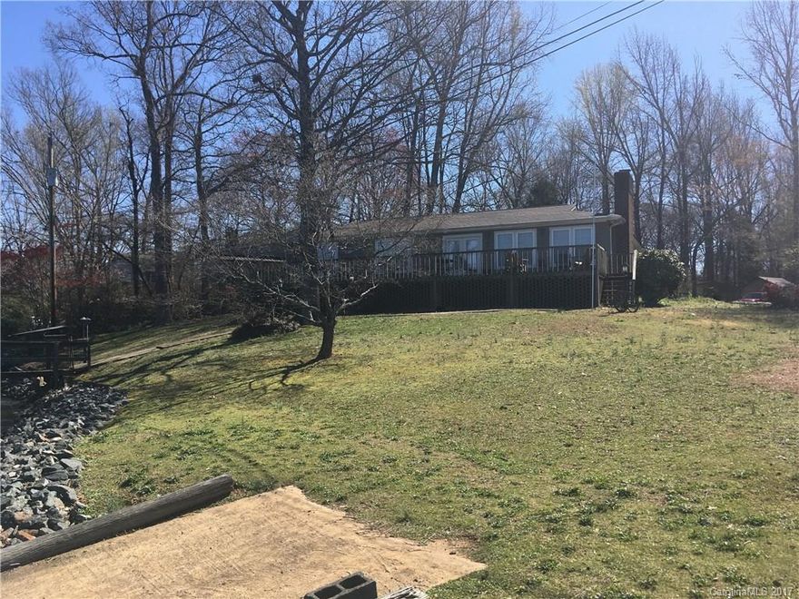 This is one of the best views on Lake Wylie. Rear deck and windows have year round unimpeded view of the water. 1800 sqft home, detached garages and storage and more. This one is what you have been looking for!!
