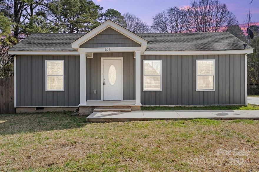 Welcome to this beautifully renovated home that boasts a new additional room built with permits, perfect for added space or a home office. Enjoy the comfort of newly installed AC (2022) and the timeless elegance of hardwood floors throughout. This charming property features a sunroom, ideal for relaxation or entertaining guests, and a renovated detached garage offering both functionality and style.

Conveniently located, this home boasts a long concrete driveway, providing ample parking space. Its prime location offers easy access to highways, making commuting a breeze. Situated less than ten minutes from Charlotte Douglas Airport, travel is incredibly convenient. Additionally, a quick drive will take you to the picturesque Crowder Mountain, perfect for outdoor enthusiasts.

Don't miss the opportunity to make this your new home, as it won't last long