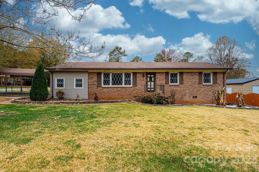 NEW PRICE! Charming 3 bedroom / 1 ½ bath brick ranch in Crestview with level .42 acre lot. Spacious living room and kitchen / dining area with new flooring. Hallway leads to bedrooms, including full bath. Primary bedroom has dual closets and half bath. Fresh paint throughout. Outbuilding has power. Conveniently located near the expanded 4-lane Hwy 16. Don’t miss this one!