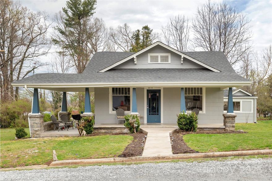 Well maintained home conveniently located in East Flat Rock. This charming bungalow features original hard wood flooring, tons of natural light, updated kitchen and bathroom. Recent upgrades include exterior paint and trim, new concrete sidewalk and patio, new mini-split unit in laundry/mudroom, counter depth stainless steel side by side refrigerator, stainless steel dishwasher. Home has also had extensive electrical and other repairs to include new gutter drain lines, screens in attic and outdoor lighting. The level green yard is perfect for pets, garden or play. This lovely home is within minutes of shopping, restaurants, schools, parks and interstate travel. Home served as an AirBnB for previous owners. Septic tank pumped and inspected June 2023. Come take a look today!