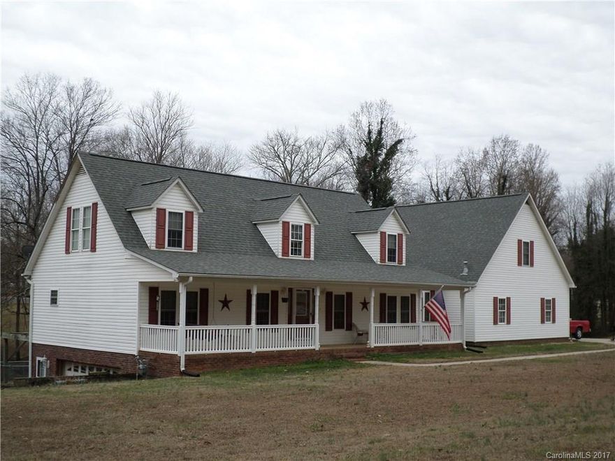 This is a lot of house and acreage for the money.  Very convenient to everywhere. 
Buyer needs to verify sq footage.   Basement is heated and cooled and unfinished. Could be huge garage 
or can be finished for workshop. 2 car garage on main level and 2 car garage in basement.
Sold As Is