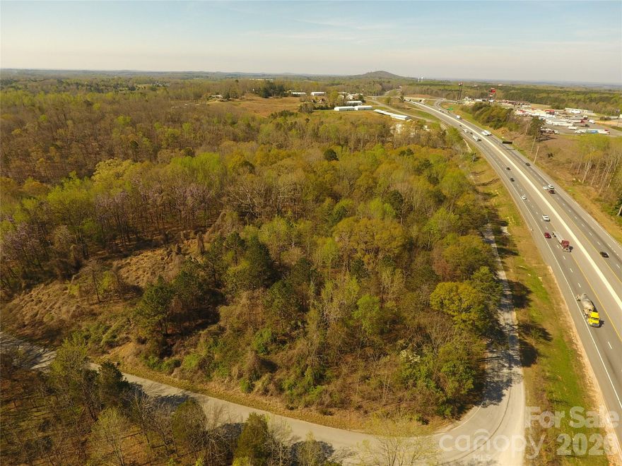 ±40.43 acres of prime commercial and industrial land located 0.4 miles from Exit 106 on I-85 in Blacksburg, South Carolina. This high-visibility site features over 2,500 feet of road frontage, including more than 1,000 feet paralleling I-85, with traffic counts exceeding 40,000 vehicles per day.

Zoned General Industrial, the property offers a flexible, development-ready footprint ideal for retail, distribution, light industrial, hospitality, or mixed-use uses. The tract includes an approximately 6.5-acre pond, adding both visual appeal and site design potential.

Located at a strong commercial exit with Pilot Travel Center, QuikTrip, and national retailers nearby, and just two exits from the $1B Catawba Two Kings Casino, this property is well positioned for long-term growth along the I-85 corridor.