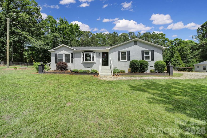 Here's your slice of paradise with room to breathe on 2.58 acres just off Lowrys Highway. This property includes a detached one car garage, a 10'x20' shed, an in-ground pool, a hot tub, a screened-in porch overlooking the pool and concrete patio, a fenced yard, and plenty of space to entertain or spread out and enjoy the quiet country life. Inside, the kitchen features an island, dark granite countertops, and a tile backsplash that contrasts with the white cabinets. Be sure to look behind the barn door on the wood accent wall to find a spacious walk-in pantry leading to the laundry room. Notice how the open floor plan is very functional, wasting no space. Several rooms have been freshly painted, the attic was sprayed with insulation, and a new roof and windows were installed in 2021. With this country setting and a backyard that feels like your own private getaway, this property makes it easy to slow down and stay awhile.