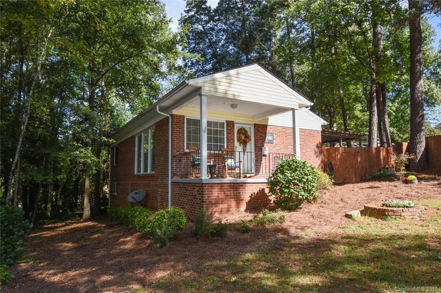 This amazing Montford Area home is loaded with upgrades and has a hard to find finished basement with a full laundry room. Features include: original refinished hardwood floors, ceramic tile flooring in the kitchen, granite countertops, lovely front porch, large fenced yard with deck & pergola, large master bedroom with walk in closet, and much more. All of this a short distance to Montford, Park Rd Shopping Center, Southpark Mall, and all of the amazing things that South Charlotte has to offer.