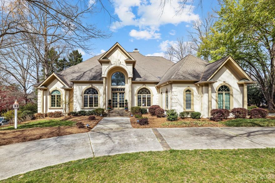 Stunning custom-built home on tree-lined street in Piper Glen. This home has it all: Private backyard oasis with in-ground pool and spa, recently renovated Primary Bathroom and Kitchen, huge basement with wine bar and kitchenette, as well as tasteful touches and renovations throughout the entire floor plan. Step inside and you'll immediately notice the soaring 11-foot ceilings, super functional layout, along with the abundance of natural light. The Great Room boasts 20+ foot ceilings with sizable windows offering a view of the private Pool deck and the neighboring pond. The vast Primary bedroom on the Main Floor features tray ceilings and leads to a tastefully redone Primary Bathroom, complete with two large closets, standalone tub and beautiful shower. The Kitchen includes newer quartz countertops, as well as newer flooring spanning the entire kitchen and sunroom. Upstairs you'll find ample-sized bedrooms, tons of storage + plenty of room for entertaining. WELCOME HOME!