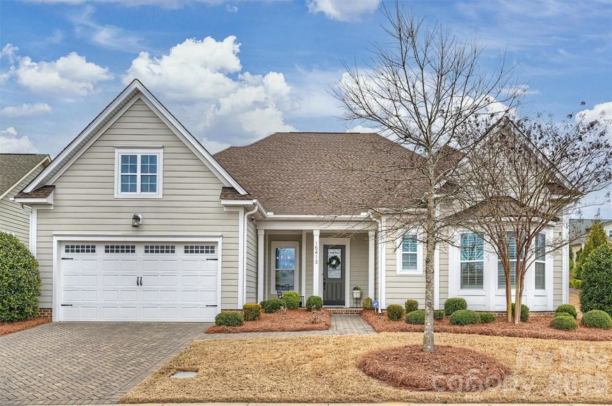 Tucked into a private setting yet just moments from community amenities, this beautifully updated home offers the perfect blend of serenity and convenience. Situated directly across from a charming pocket park, the property enjoys peaceful sunset views from the front porch and a backyard retreat with mature landscaping - ideal for unwinding on the patio after a long day.  Thoughtful updates elevate both style and function. The kitchen was fully refreshed in June 2020 with resurfaced and repainted cabinetry, quartz countertops, new sink, faucet, and updated hardware, creating a clean, modern feel. Large picture windows across the back of the home and a trifold sliding door bring beautiful natural light into the kitchen, living area, and keeping room.  The main level features a spacious primary suite, along with an additional bedroom and full bath. Upstairs, you’ll find another bedroom, full bath, and a generous bonus room ready to serve as a media space, home office, or playroom.  Designer lighting in the foyer and dining fixtures, and Velora bathroom lighting - adds warmth and character, while updated bathroom mirrors and hardware provide a polished finish. Handcrafted wood shelving in the living room and additional custom wood shelving in the upstairs family room add character and additional storage.  Additional features include fully tiled showers in the secondary bathrooms, ceiling fans in the bedrooms, custom laundry room shelving, a walk-in laundry room, a 240V breaker with wiring for electric vehicles, and irrigation around the home.