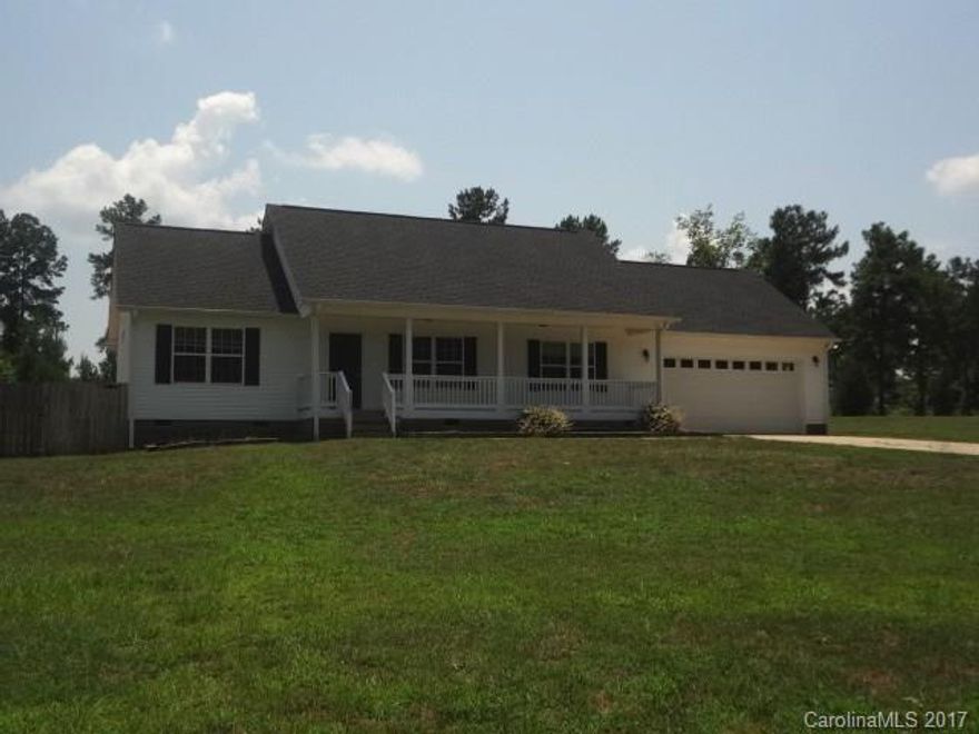 Area qualifies for 100% USDA financing. Split bedroom plan situated on 1.25 ac. 3 Bedrooms & 2 Baths. Family rm w/vaulted ceiling/fan. Master BR w/trey ceiling/fan & walk-in closet. Master bath w/dbl sinks.  Large kitchen/dining rm w/breakfast bar & stainless built-in microwave, dishwasher, & smooth-top range. Mud room/laundry room. 33 ft rocking chair front porch, 24x28 Over-sized Attached Garage. Deck and Fenced Rear Yard. Shows like new. County Only Property Taxes for Owner Occupants.