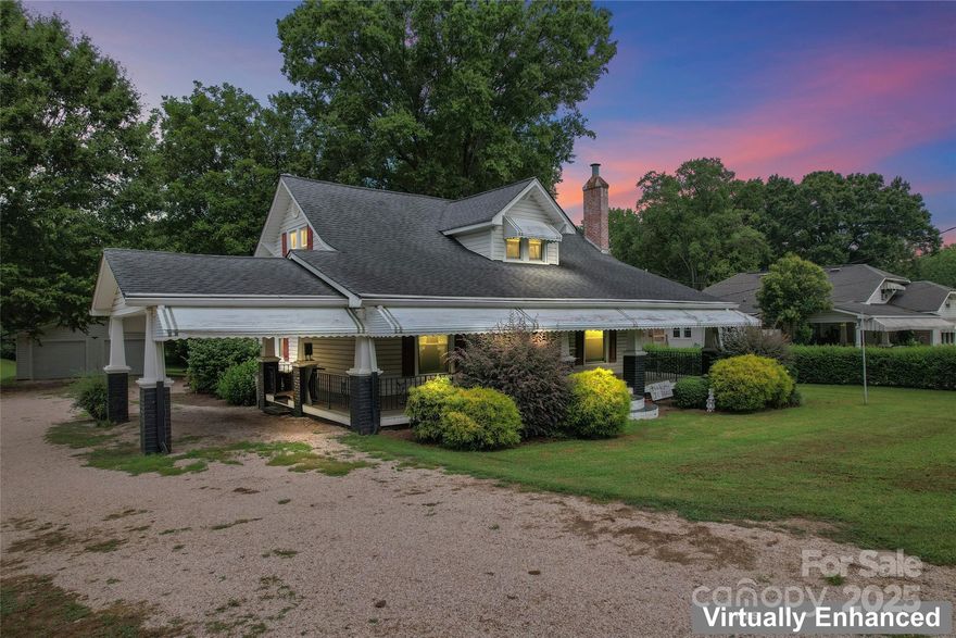 Full of vintage charm, this spacious home near downtown Kannapolis is a rare find! Loved for generations, it features original trim, a beautiful staircase, and French doors to a formal dining room. Main-level bedroom & tiled bath, plus a flex room that would be a great office. Updated kitchen with soft-close shaker cabinets needs your final touches New waterproof vinyl plank floors throughout downstairs. Upstairs has 3 bedrooms (large primary with walk-in closet, and bathroom with clawfoot tub), plus an office/playroom. Updates/renovations are needed but home is livable as-is...it won't take much to "glow-up" this beauty! Heat throughout; central HVAC downstairs with easy potential to add upstairs. Outside: deep ½ wrap porch with wrought iron rail & brick columns, rear deck with ramp, carport, oversized 2-car garage w/ workshop. Beautiful yard! 2.41-acre lot behind (MLS #4171174) can be neg with purchase!