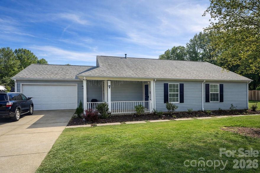 Charming 3-bedroom, 2-bath ranch-style home with inviting curb appeal and thoughtful updates throughout. Featuring brand-new LVP flooring in the kitchen, hallway and living room and a new HVAC system installed in 2024, this move-in ready home offers a functional single-level layout filled with natural light and comfortable living spaces. Enjoy relaxing mornings on the covered front porch, complete with classic columns and a welcoming entry that adds to the home’s character. 

The beautifully updated backyard provides a private outdoor retreat—perfect for entertaining, gardening, or unwinding. A spacious yard and well-maintained exterior enhance the overall appeal, while the attached garage and extended driveway offer added convenience. A French pipe was added to the front of the property to help with the draining. Ideally located near Reedy Creek Nature Preserve, Mint Hill, and Uptown Charlotte with easy access to shopping, dining, and major roadways. A perfect blend of comfort, updates, and location—this home is a must-see. Schedule a tour today!
