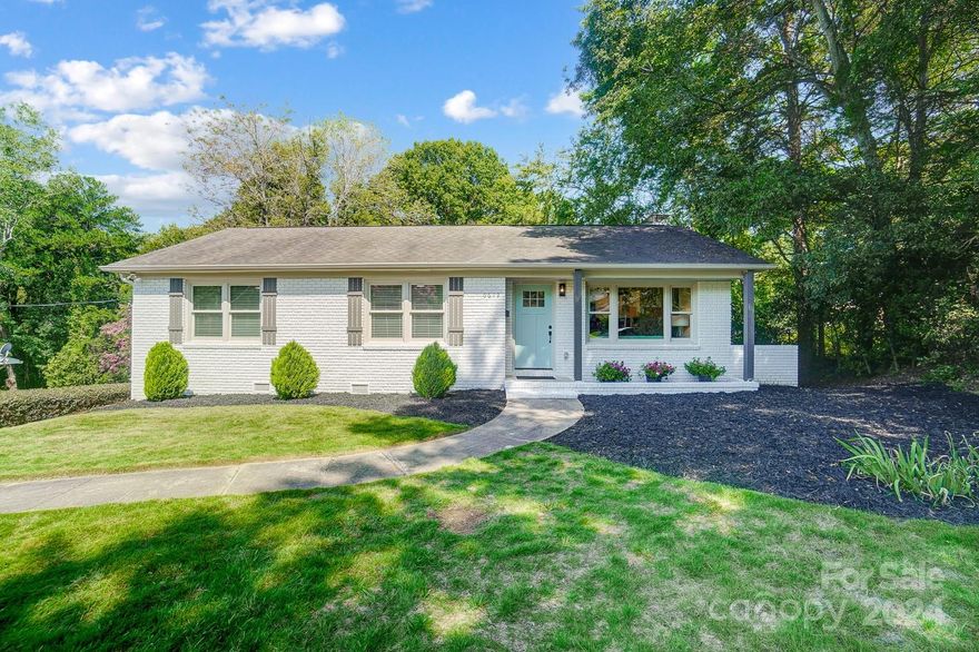 Experience luxury living in this fully renovated 4-bedroom, 3-bath home with versatile flex space! Every detail has been masterfully crafted, from new electrical and plumbing systems to a brand-new HVAC unit and tankless gas hot water heater. The stunning extra-large kitchen features white shaker cabinets, quartz countertops, and a spacious island, perfect for entertaining. The elegant primary suite boasts dual walk-in closets and a spa-like bathroom with a walk-in shower and ample storage. Original hardwood floors have been beautifully refinished, adding warmth and character throughout the main level. Enjoy the cozy living room with a custom fireplace, and step outside to a newly built deck overlooking a beautifully fenced yard with a stamped concrete patio. The lower level offers a family room with a refurbished wood-burning fireplace and a dedicated laundry area. With permits pulled and passed, this home is ready for you to enjoy. Don’t miss this opportunity in desirable Starmount!