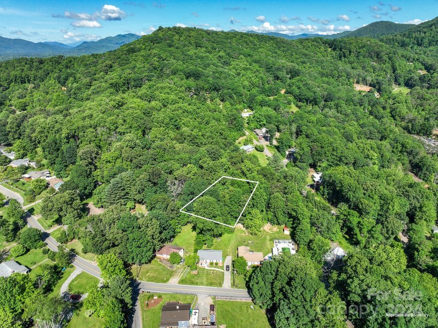 14 Fair Bluff Lane combines country living and the convenience of a location that's minutes away everywhere you want to be! The 0.51-acre lot has a very gentle slope, making it an ideal canvas for your custom build. Only 5 minutes to I-40, and a little further to the heart of West Asheville, and 15 minutes to downtown Asheville. Don't miss the neighboring lot also for sale at 10 Fair Bluff Lane, MLS 4144388.