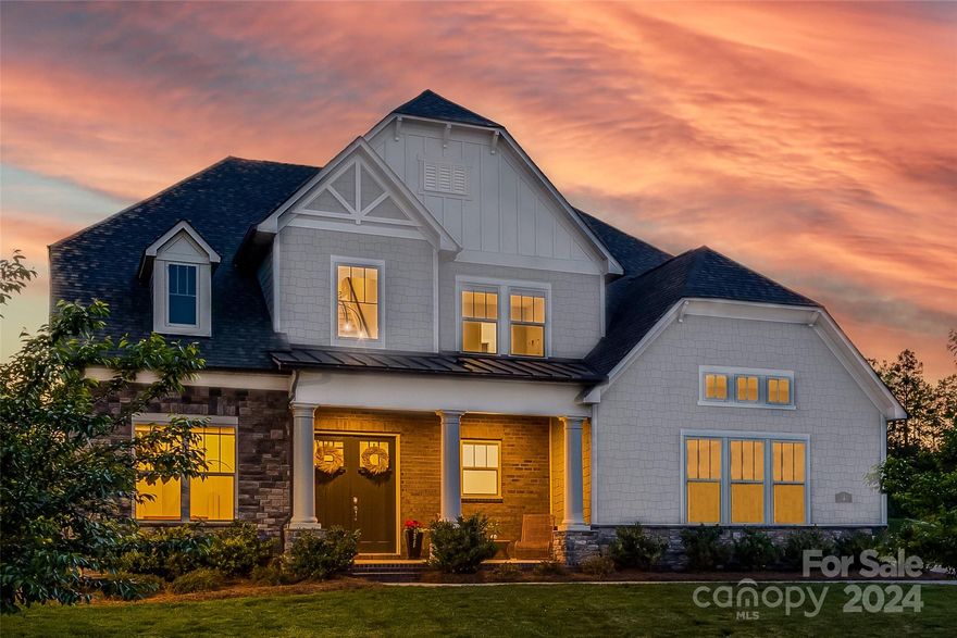 With just over half acre and situated across from a community greenspace, this well-maintained home awaits you! A rocking chair front porch greets you & welcomes you in to a dramatic 2-story foyer. At the heart of the home is a true chef's kitchen, w/ gleaming quartz counters, stainless steel hood, & expanded cabinets & counters including the perfect beverage fridge nook! The great room boasts coffered ceiling & gas fireplace, w/ tons of natural light. There is an additional planning center off the kitchen, & a guest bed w/ ensuite on main as well. The primary suite is sure to impress with its private retreat area, dual quartz vanities (all baths have quartz!), garden tub, & loads of cabinetry & storage. The third floor has a spacious bonus w/ half bath, giving options & flexibility. Substantial features were added incl custom blinds (blackout in the bedrooms), designer light fixtures, extra garage storage, & more! With it's top rated schools & convenient location - Welcome Home!