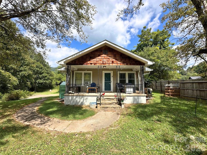 Charming home in Fairview—just a short drive to Asheville.

This 3-bedroom, 1-bath home offers 1,034 sq ft with a warm, inviting feel and a covered front porch perfect for morning coffee or unwinding in the evenings. The real standout is the spacious yard—plenty of room to garden, entertain, or simply enjoy the peaceful surroundings. A great opportunity for a primary residence, rental, or investment in a convenient and desirable location.