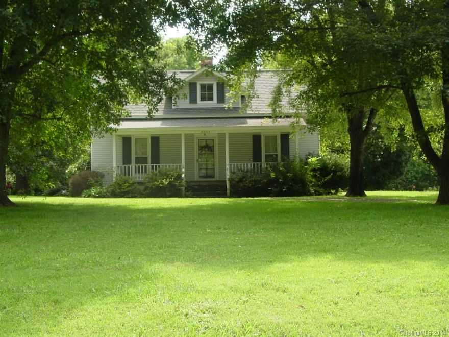 Completely remodeled bungalow in North Stanly. Great front porch & rear deck. Spacious living room with arched foyer opening. Kitchen has large island & plenty of storage in updated cabinetry & pantry. Oversize attached two car garage, all situated on 0.43 acres