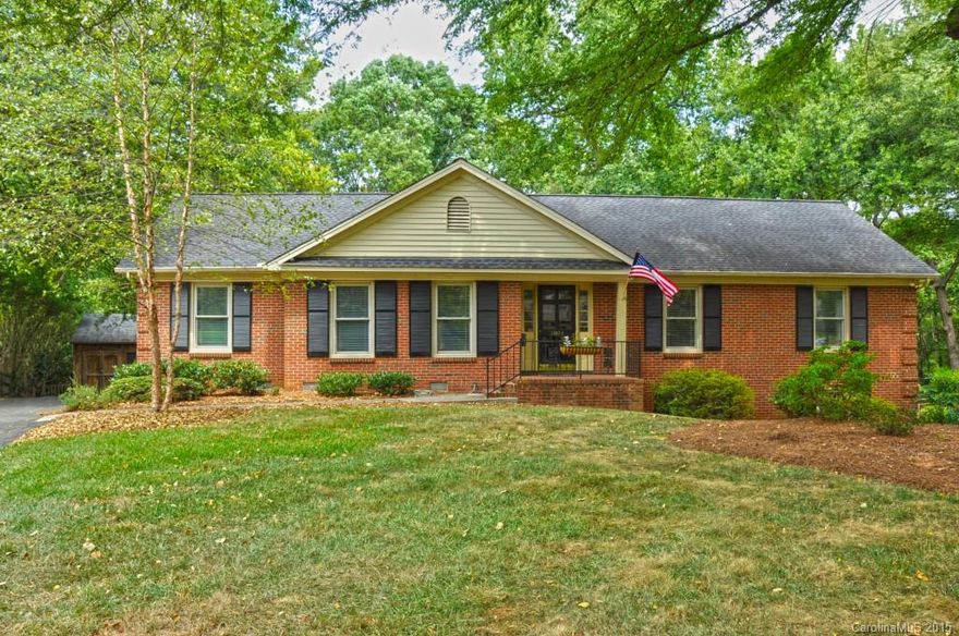 Reduced!  Best value in Beverly Woods! Wonderful wood floors thruout living areas and bedrooms.Two tubular skylights add natural light. Fantastic screened porch of almost 250 sq ft adds almost year round additional living space - overlooks the fenced yard backing up to trees for added privacy! Two fireplaces - den plus lower level.  Lower level flex space can be used for a multitude of purposes and provides tons of additional storage space! Great schools and Southpark location!1 year warranty!