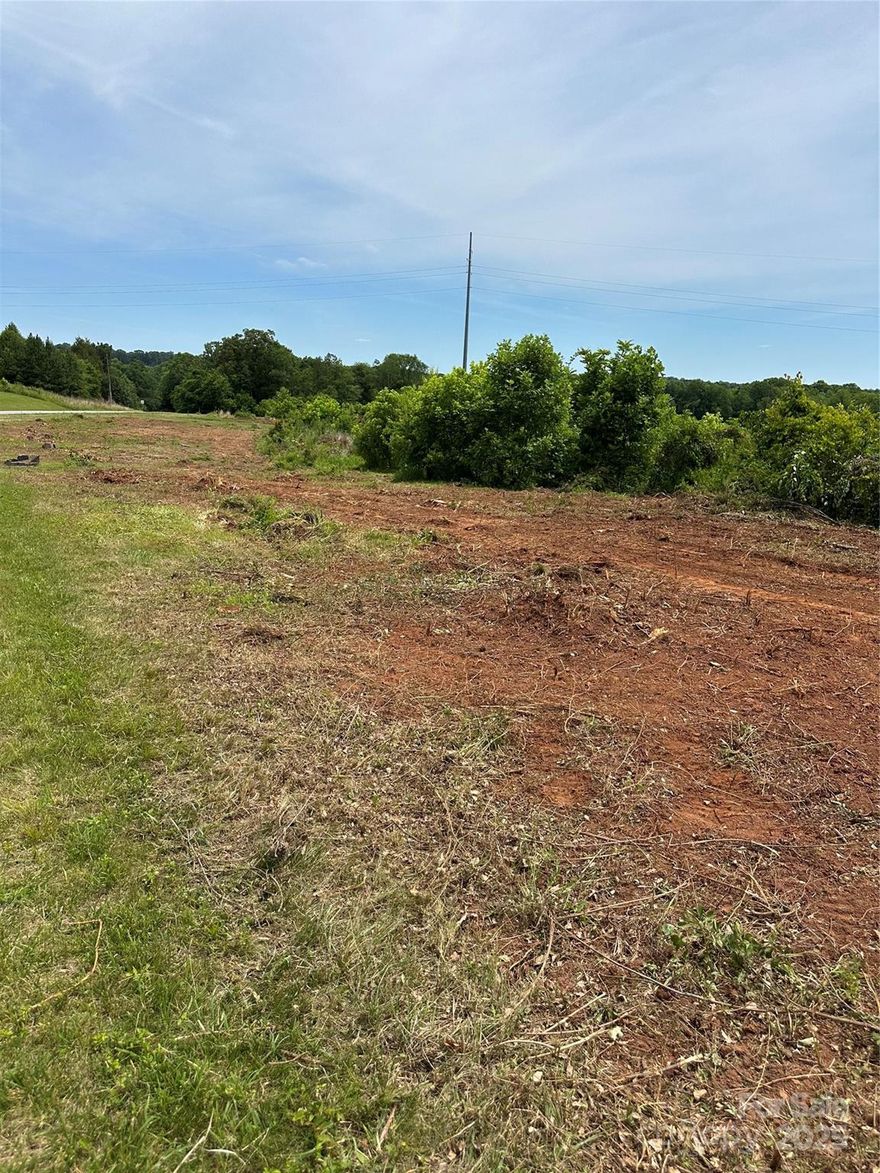 Bring your vision—and your chickens! This  cleared, level lot offers the perfect setting to build your dream home, barndominium, family estate, or even purchase as an investment property. With a perk letter already on file, it's one step closer to being ready for construction. Enjoy the peace and privacy of country living while still being just minutes from I-40, making travel to Statesville, Hickory, and beyond a breeze.
Located in the charming town of Catawba, NC, this area offers the best of small-town living with convenient access to modern amenities. Enjoy weekends at Riverbend Park, explore local vineyards like Catawba Farms, or take advantage of the area’s hiking trails.
There are **six lots available**, all cleared and perked, giving you multiple options whether you’re looking to build one home or develop a small family compound.
Bring your builder—and your chickens—and make your dream a reality!