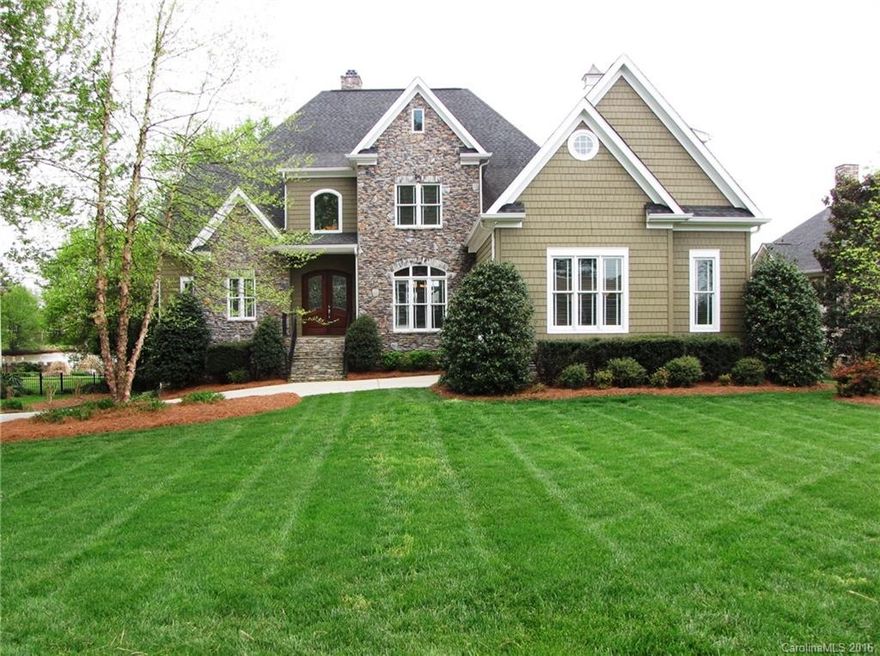 CUSTOM BUILT WATERFRONT HOME by Builder-Owner with Boat Dock and Deep Water Channel and 123' of Shoreline. No Detail Overlooked! Impressive Lake Views. In-Ground Pool w/Spa and Cabana. TWO Separate Attached 2-Car Garages w/Workshops. Upper Level Media Room. Master on Main Level. Generator hook up.  Too much to list and see.  This All-Inclusive Home requires an on-site visit if you are looking for a Lake Norman waterfront home with Boat Dock and all amenities.