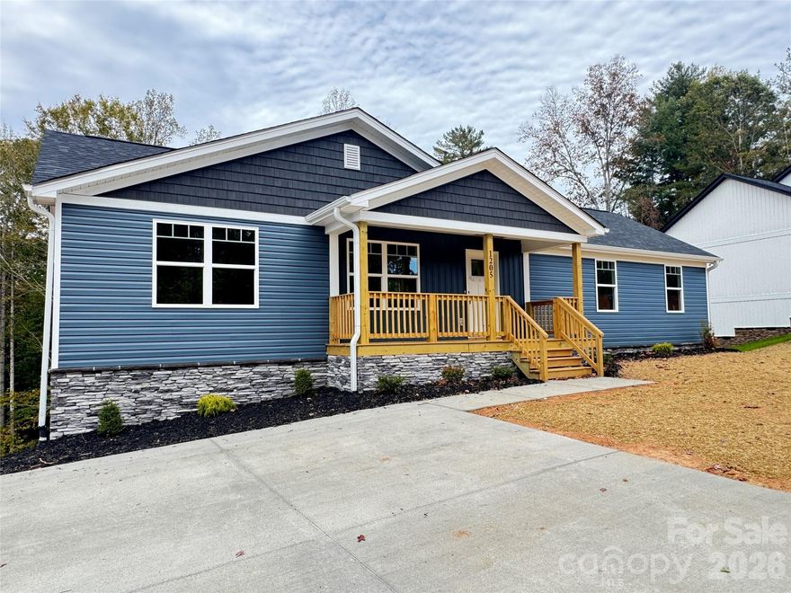 Very nice new construction 6 bed, 3 full bath home located in a beautiful hilly neighborhood offering plenty of privacy. Estimated completion 7/31/25. The main level features soft-close cabinets, wood-look vinyl and carpet flooring, granite countertops in the kitchen and bathrooms, an open floorplan with a deck off the kitchen, and a separate laundry room. The full basement includes a walk-out porch with steps to the backyard, 2 additional bedrooms, 1 full bath, and storage areas. This is a very nice home with great space and quality finishes. Listing agent has ownership in the property.