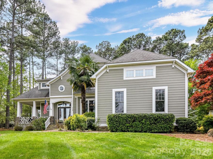 Beautiful custom-built home on a private wooded cul-de-sac in Lake Norman—move-in ready and meticulously maintained. This bright, open floor plan features gleaming hardwoods, a versatile sunroom, and a chef’s kitchen updated with granite, stainless appliances, and a large island perfect for entertaining. Step into your formal dining room with elaborate moldings & trim as well as a bright & airy great room with a cozy, gas fireplace. The spacious primary suite offers a tray ceiling, large windows, and a spa-like bath with dual vanities, soaking tub, and separate shower. Upstairs, you’ll find generously sized secondary bedrooms, full baths, and a versatile loft/flex space perfect for a home office or study area, along with a massive bonus room ideal for a media room, playroom, or additional living space. Significant infrastructure updates provide total peace of mind, including a brand-new well with all-new piping. The outdoor oasis boasts a paver patio, mature landscaping, wooded views, and an elegant black iron fence. Complete with a 3-car garage and storage shed, this home is minutes from the lake, golf, shopping, and dining. Exceptional quality and modern reliability in a prime location!