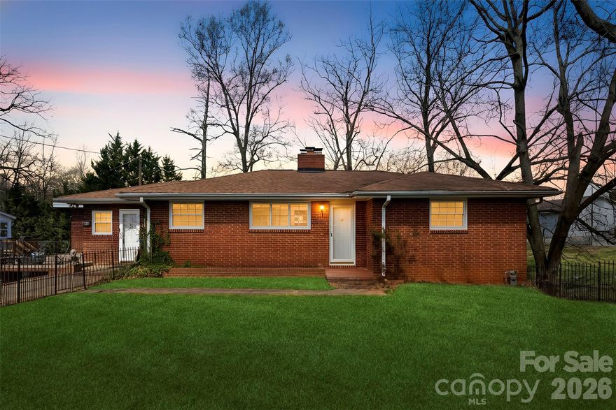 Classic brick ranch located within the city limits of Bessemer City on a .29 acre lot. The main home offers 3 bedrooms and 2 full bathrooms and features the solid construction and functional layout typical of its era. While the interior reflects a more traditional style, the home offers great bones and an excellent opportunity for updates and personalization. An added side expansion provides additional living space that includes a living room, bedroom, bathroom, kitchen, and dining area. This flexible layout offers a variety of potential uses to suit a buyer’s needs. The property also includes a full walkout basement with concrete floors, approximately equal in square footage to the main level. A wood stove is in place, and the space provides ample room for storage, workshop area, or future finishing possibilities. Located within walking distance to downtown Bessemer City, you’ll love easy access to live music, local restaurants, and the new Stinger Ballpark with its playground, splash pad, and walking trail. This home offers the perfect combination of character, comfort, and convenience, along with a flexible layout suited for multi-generational living, guests, or additional private living space.