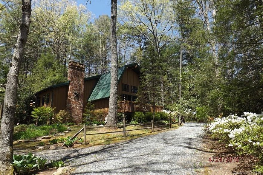 Cedar A Frame Hm tucked in Natural Woods just under 1 acre, 1 mile from entrance to Pisgah Forest. Close to Brevard, 20 min to Airport. 3 bdrm, 2 ba, full Bsmnt/w wd burning stove and utility sink. 4 yr old roof, updated Kitchen and Bath. Built in bk shelves and Gas Jutul stove in dining area. Beautiful log stone fp in family rm. Beautiful front deck facing East. Large back Deck faces West/w Serene Waterfall and coy pond. Attached 2 car Carport/w circular driveway! Plenty of Space and Privacy!