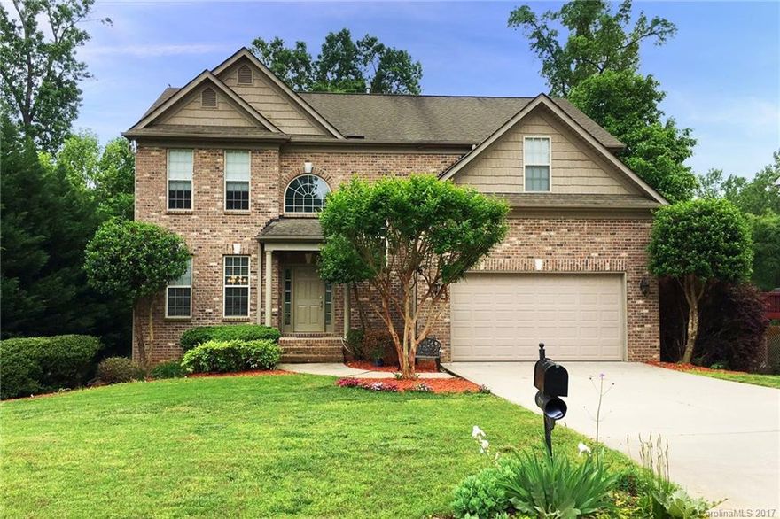 A MUST SEE!4 bedroom 3 1/2 bath w/full finished walkout basement.Gourmet kitchen opens up to a large great room w/fireplace.Granite counters/stainless appliances.Formal living + dining rooms.Tons of hardwoods + lots of light.Large master suite w/separate tub/shower.HUGE finished walkout basement w/bathroom for entertaining or could be used as an in-law/guest suite.Private fenced backyard backs up to woods.Close to shopping/interstate.Fort Mill schools.ALL YARD CARE/MOWING Included.NO DOGS/CATS