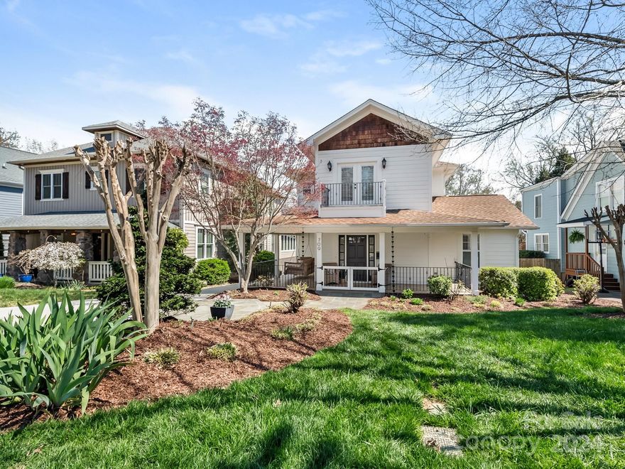 Charming updated home in the heart of Dilworth! Walking distance to shops, restaurants, the light rail and so much more! Welcome to 709 McDonald with an inviting gated front porch and lovely large foyer. The open floor plan offers a kitchen with granite countertops, island with gas cooktop, wet bar area with beverage refrigerator and ice maker, a dining area and large open family room which leads to a wonderful screened porch and large deck. The main level also has an office, guest bedroom and full bath. The upper level features a loft area perfect for reading, laundry room, and two additional bedrooms with a jack and jill bath. The primary suite has a balcony, oversized custom closet and a renovated primary bath with a large tiled shower. The lower level has a bonus room with so much flexibility-playroom, secondary office, gym, or tv room and opens to a covered area and the back yard. Two car carport and an electronic gate. Fully fenced backyard. Don't miss this one!