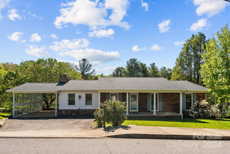 Rare opportunity in Mars Hill city limits! 4BR, 2.5 BA brick rancher in established neighborhood in Mars Hill. Brick exterior reflects the solid craftsmanship found throughout the home. Beat the chill on game night in front of your wood-burning fireplace in the den, Start your spring mornings in your well-lit kitchen and dining area, which open onto the back deck (the perfect spot to have coffee and listen to the birds!). Oversized windows let loads of natural light flow into the front of the home. Basement level offers thoughtful features including a cozy family area w/ built-in shelving & storage, a bedroom with full size window, a large cedar closet & an en suite full bath. Perfect for your teenager, your music room or perhaps your home office. 
Plenty of space in the large, open unfinished basement/laundry room for woodworking, crafting, or simply storage. Property is close to Mars Hill University, Main Street restaurants and mere minutes to Ingles grocery. Fiber Optic available.