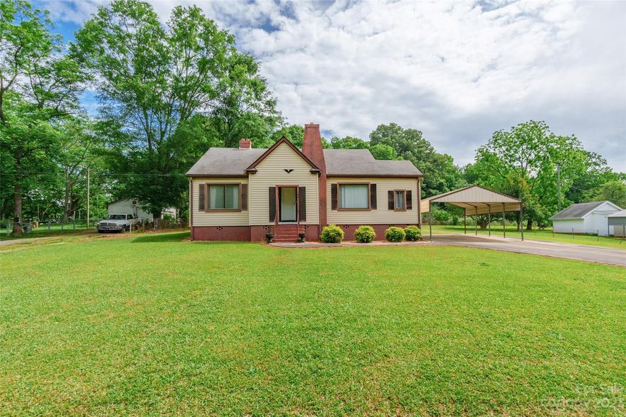 This adorable 2 bedroom 1 bathroom home with a flex room sits minutes from downtown Fort Mill and has endless potential! A sizeable yard with a fence along the property line also has two wired storage sheds and an additional shed, a double carport, and a large back deck. Inside are spacious rooms ready to be personalized and traditional bead board ceilings with a classic look. This promising home has so much to offer and is ready for a new owner to make it their own!