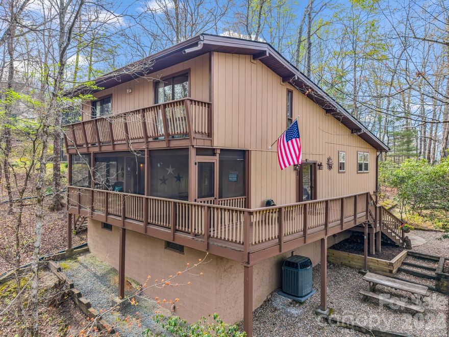 Welcome to an exceptional value in Connestee Falls—where quality updates at this price point are a rare find. Close to the East Fork Gate and a short drive to all Connestee Falls amenities, this home is a true haven for nature lovers. Enjoy morning coffee or evening gatherings on the expansive open deck, or relax in the large screened-in porch overlooking peaceful green space, where the sights and sounds of the forest surround you.
The meticulously maintained home features a welcoming layout with a large primary bedroom with an updated en suite, laundry room, and guest bathroom on the main level.  In addition, two bedrooms on the second floor are ideal for guests or a private retreat. The unfinished basement, with a concrete floor spanning the home’s footprint, offers abundant space for a workshop and extensive storage, with convenient access to the level-entry driveway.
This home is in the coveted Connestee Falls Community which offers, one of the top-rated golf courses in North Carolina, four lakes, 20+ miles of hiking trails, tennis, pickleball, pool, two restaurants, fitness center, and clubhouse, all within this spectacular gated community.
Note: Connestee Falls POA has a buy-in amenity fee of $14,000 if paid at closing. Short-term vacation rentals are allowed, with a minimum 2-night stay. Buyer to check directly with the Connestee Falls Property Owners Association for details.
Whether you’re searching for a full-time residence or a mountain getaway, this property offers the perfect blend of tranquility, convenience, and value in one of Western North Carolina’s most sought-after communities.