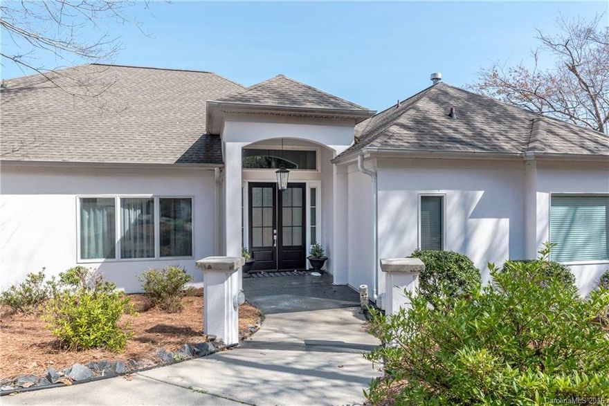 Tranquil Lake Wylie living with 180 degree unrestricted lake views from full length porches and patios or take the golf cart down to the dockside gazebo. Modern interior with great room open to kitchen and eat in areas. Master and guest room on main floor. Bright and breezy with second kitchen and mini master in bsmt. Large workshop, 15 x 15 studio "she-shed" by the lake, 3 car garage, plenty of parking. Enjoy Palisades area living with no HOA. MLS directions take the paved road to driveway.