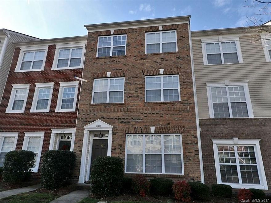 Right where you want to be! Walk out to shopping, dining, movies, exercise facilities! Hop on the interstate. Perfect location! Enter on the ground floor to a spacious Den w/half bath on that level. Wonderful open entertaining space on 2nd level with formal Living/Dining area + Kitchen/Family Rm with FP. Breakfast Nook has sliders to large rear deck. 2nd half bath on this level. 3rd level has vaulted Master w/ private bath, 2 BRs + 2nd full bath. Two car garage, driveway + on-street parking.