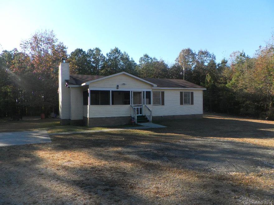 Price to sell FAST!!! Prefect 3BD, 1Bth family home, includes fireplace great for winter months. Concrete driveway, spacious screen front porch, beautiful 1 acre yard!!