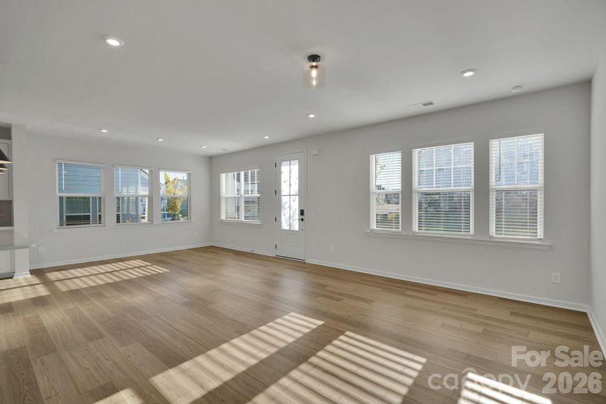 Back on Market at no fault of the seller!!
This lovely END UNIT townhome has it all! Walk in to find stunning, pre-finished wood flooring throughout the first level, lots of natural light, and an open floor plan - perfect for entertaining. The chef’s kitchen includes white cabinets, stainless appliances (Refrigerator INCLUDED!), gas cooktop, quartz counters, tile backsplash, and a huge kitchen island. Head up the modern, open-rail staircase to find a loft/flex space and generous secondary bedrooms. The Primary suite features a walk-in closet and spa-bathroom with tile flooring, dual vanities, private water closet, and an unbelievable tile shower w/bench! The two-car garage has an extra storage area, and there is a drop zone for your convenience. The neighborhood offers fantastic amenities, including a dog park, picnic area, playground, pond, and walking trails—all just minutes from everything Harrisburg has to offer. Welcome home.